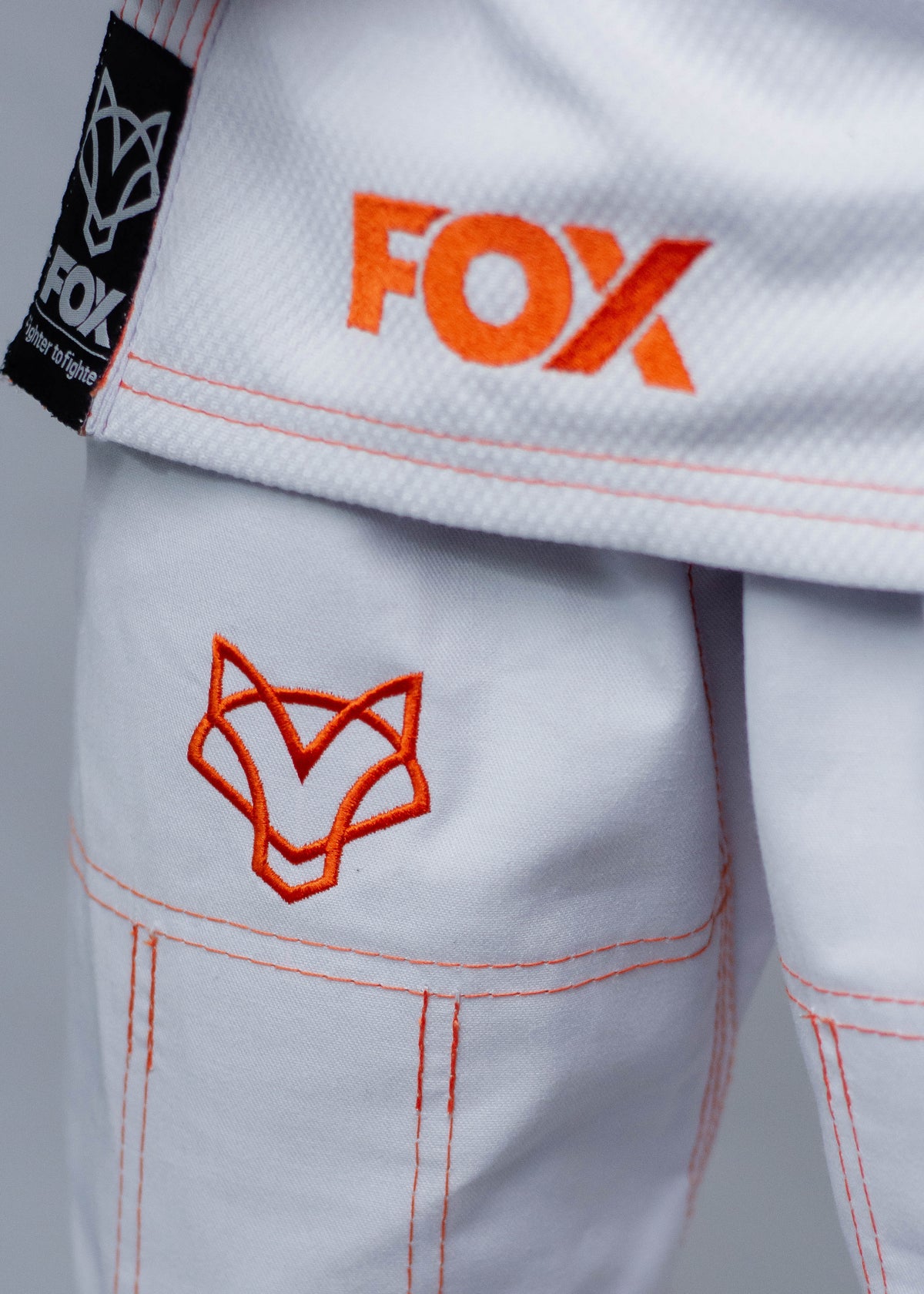 Kimono Trançado Jiu-jitsu Infantil Kids Fox - Branco com Laranja