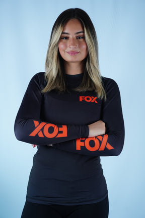 Rash Guard Jiu-Jitsu Feminina FOX FW Preta Manga Longa (Logo Laranja) UV 50+