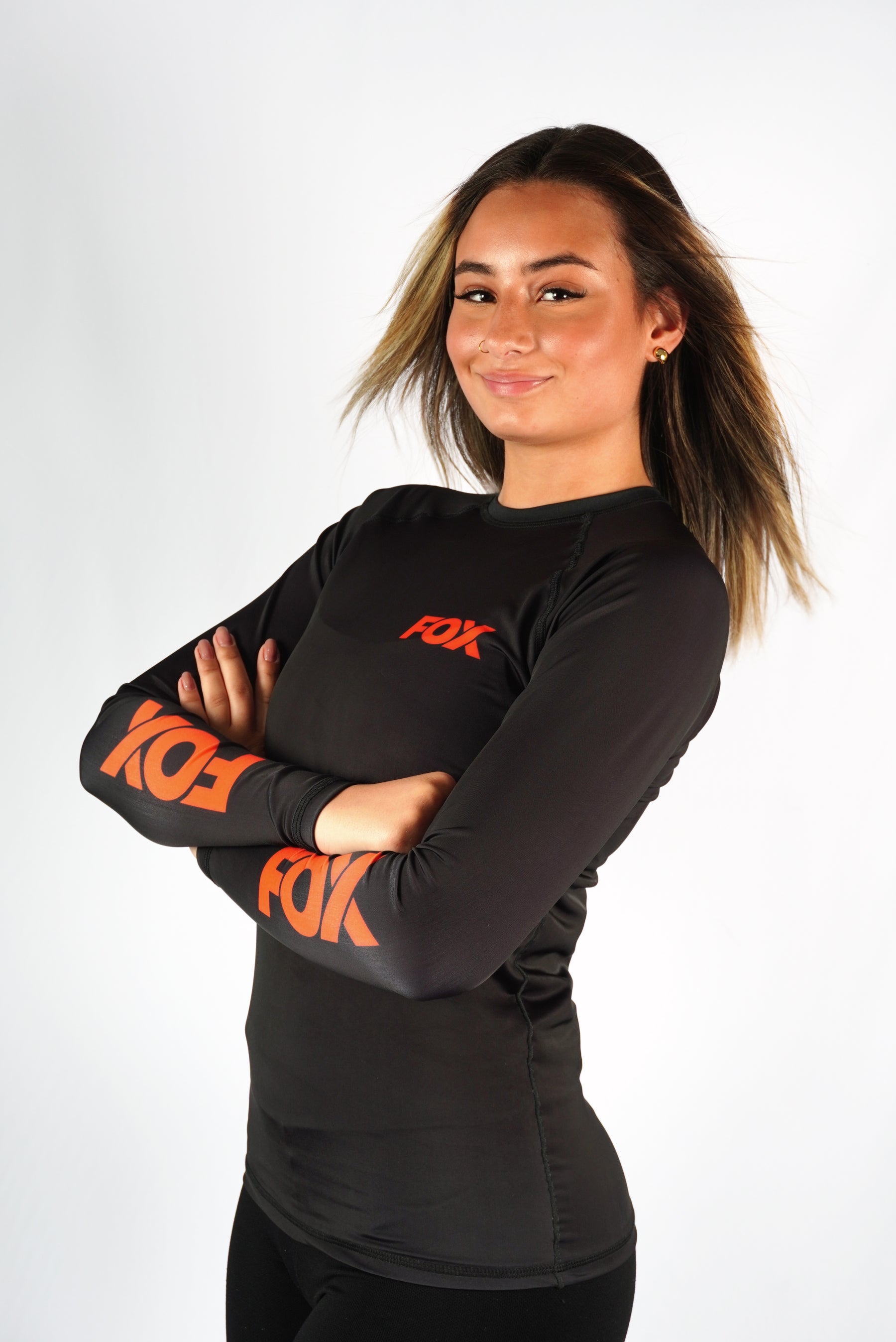 Rash Guard Jiu-Jitsu Feminina FOX FW Preta Manga Longa (Logo Laranja) UV 50+