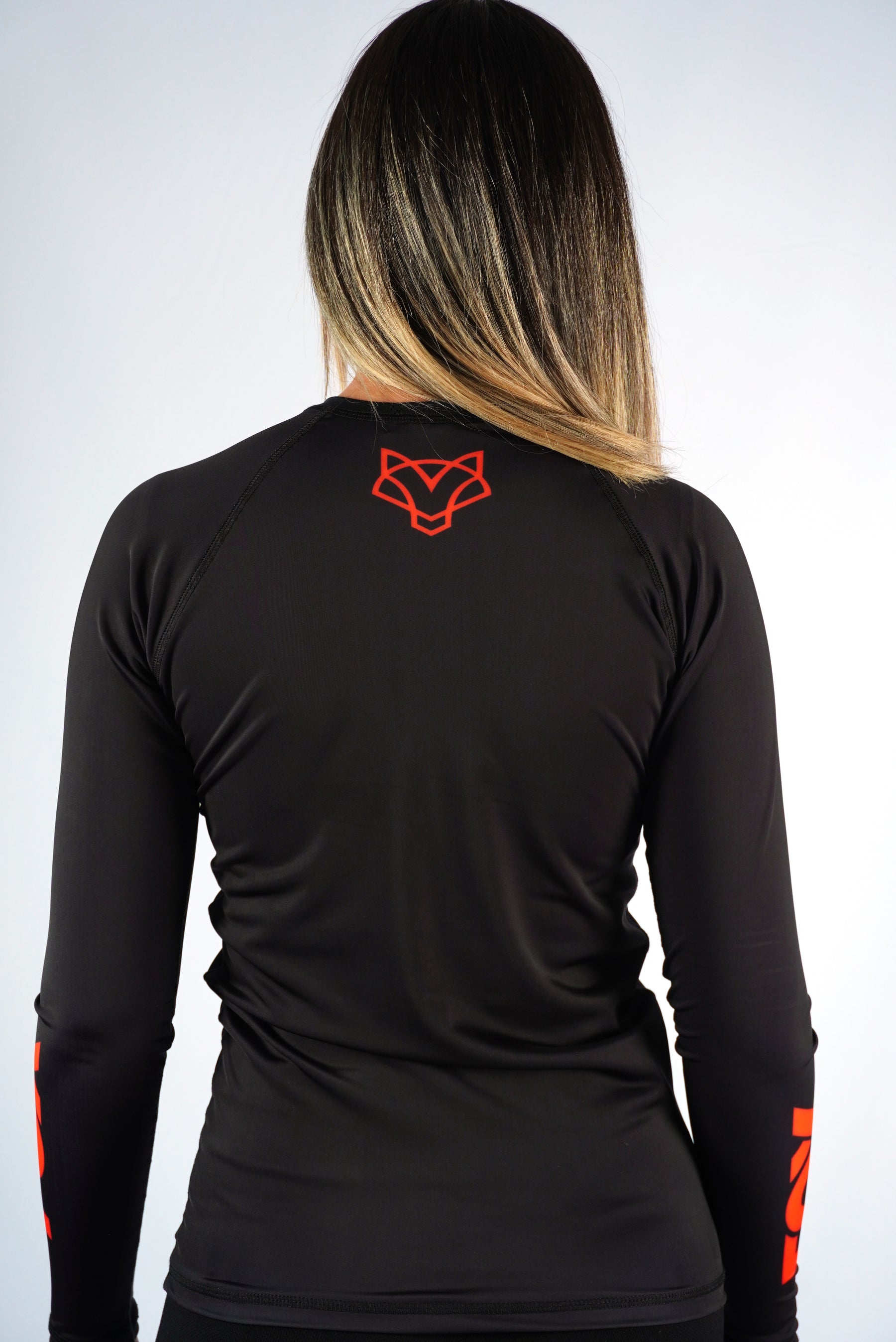 Rash Guard Jiu-Jitsu Feminina FOX FW Preta Manga Longa (Logo Laranja) UV 50+