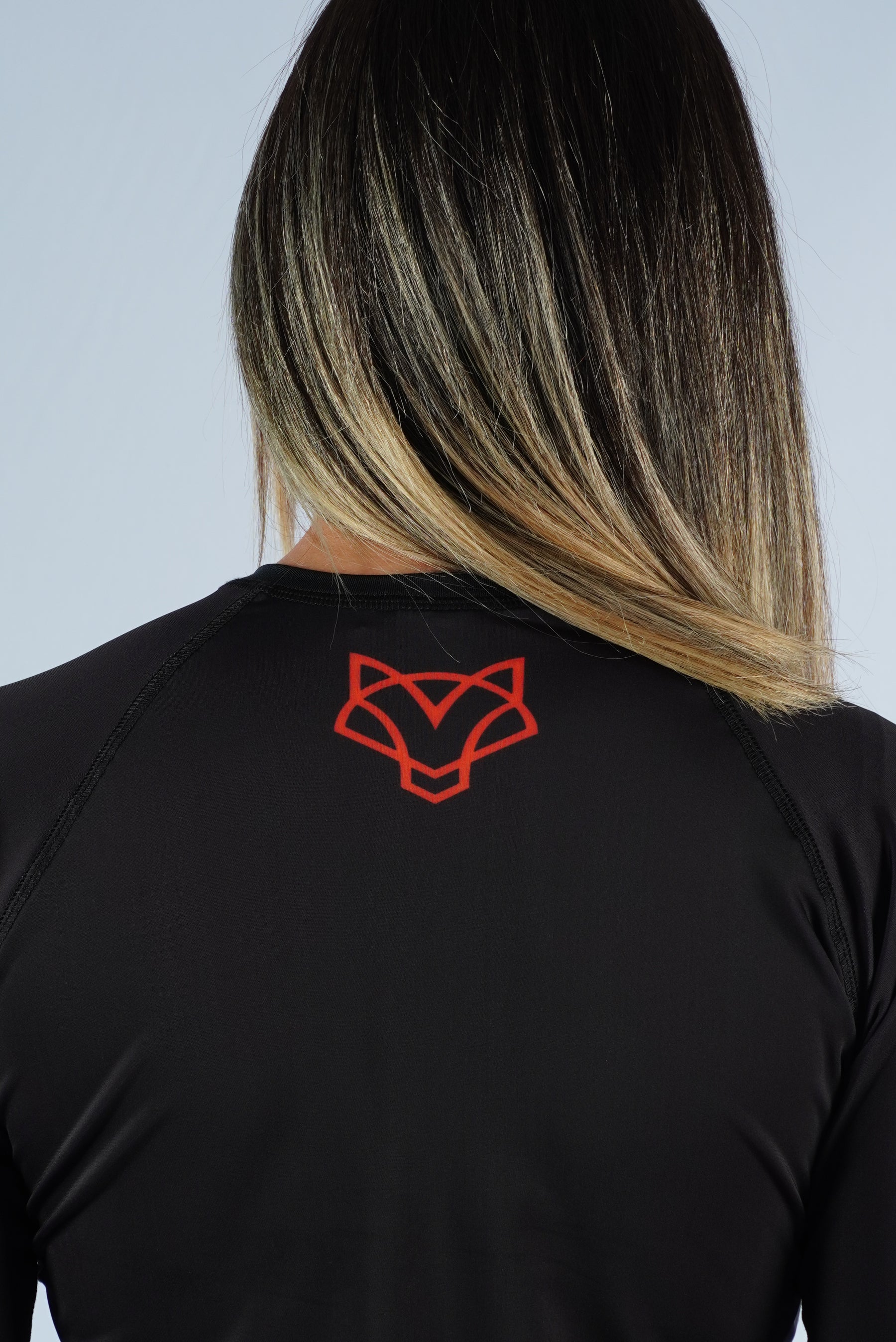 Rash Guard Jiu-Jitsu Feminina FOX FW Preta Manga Longa (Logo Laranja) UV 50+