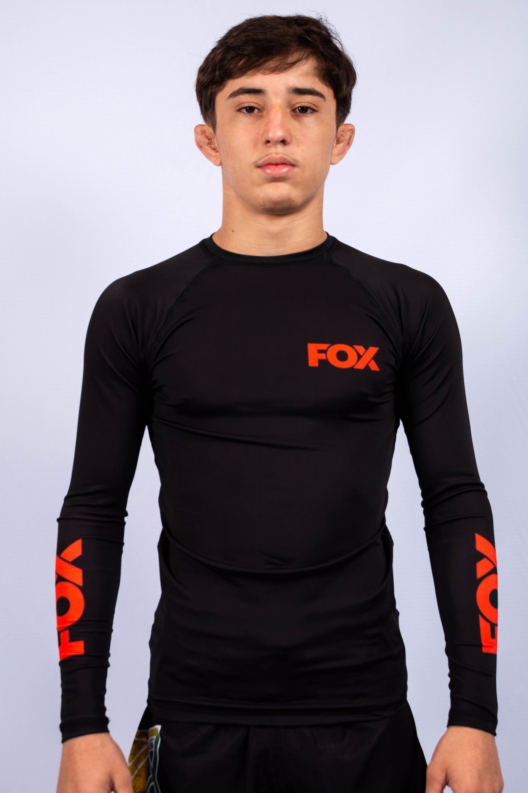 Rash Guard Jiu-Jitsu FOX FW Preta Manga Longa (Logo Laranja) UV 50+