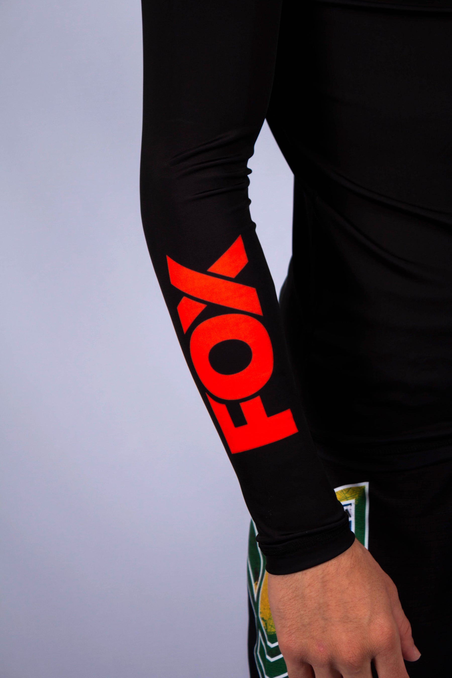 Rash Guard Jiu-Jitsu FOX FW Preta Manga Longa (Logo Laranja) UV 50+