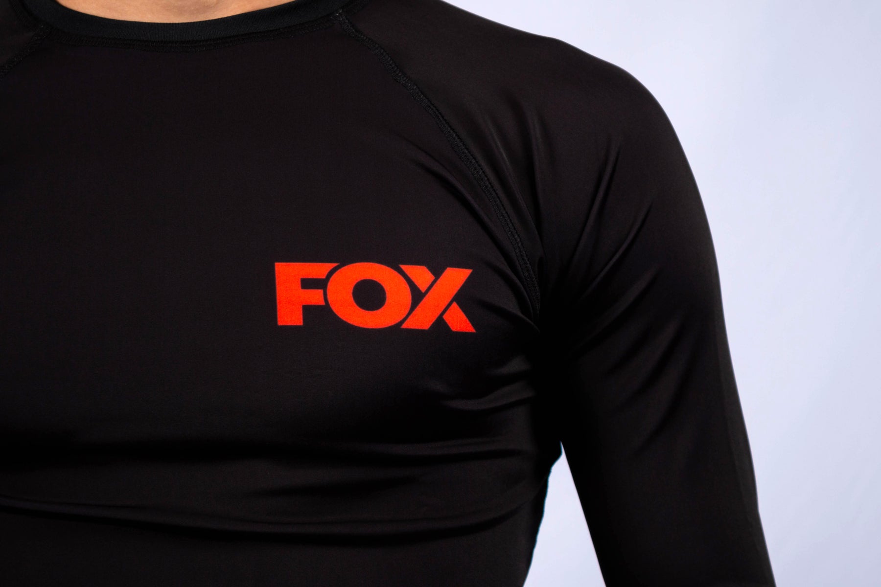 Rash Guard Jiu-Jitsu FOX FW Preta Manga Longa (Logo Laranja) UV 50+